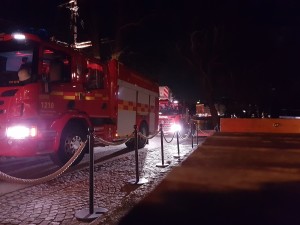 The fire department has arrived at the hostel